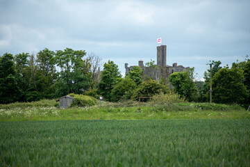 View of medieval Warkworth Castle from afar 