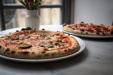 Roasted vegetable cheese and pepperoni pizza