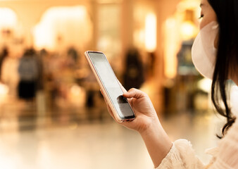 Close-up image of female hand using mobile smartphone. concept of searching or social networks.