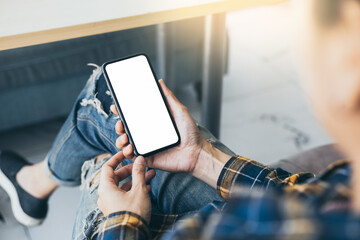 cell phone blank white screen mockup.hand holding texting using mobile on desk at office.background empty space for advertise.work people contact marketing business,technology