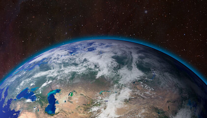 View of Earth from outer space with millions of stars around it."Elements of this image furnished by NASA