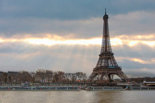 Paris Eiffel Tower and river Seine in Paris, France. Eiffel Tower is one of the most iconic landmarks of 