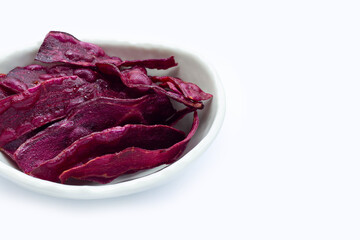 Purple sweet potato chips on white