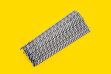 Welding electrodes on yellow background