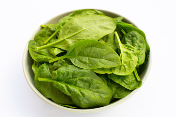 Spinach leaves on white background.