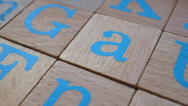 Macro Wooden Cubes With English Alphabet Slider Shot
