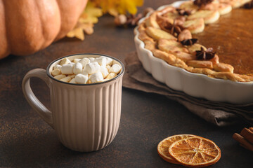 Autumn coffee and Pumpkin pie for cozy day. Close up.
