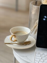 cup of coffee and laptop