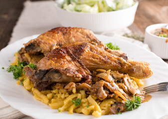Spaetzle noodles with roasted chicken and creamy onion sauce