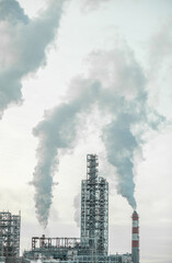 Petrochemical industrial factory of heavy industry, power refinery production with smoke pollution.Thick smoke is coming from the factory's chimney. smoke smog emissions bad ecology aerial photography