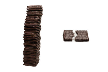Dark chocolate candies isolated on white background.