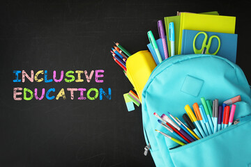 Turquoise backpack with different stationery and phrase INCLUSIVE EDUCATION on blackboard, top view