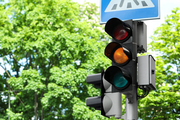 Post with traffic lights and Pedestrian Crossing road sign outdoors - obrazy, fototapety, plakaty