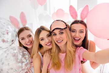 Photo of four charming positive ladies make selfie record video light interior house indoors