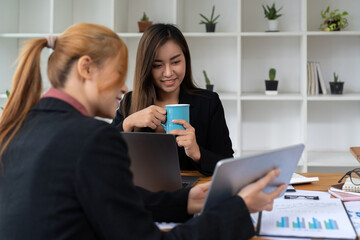 Business asian people are meeting for analysis data figures to plan business strategies. Business discussing concept