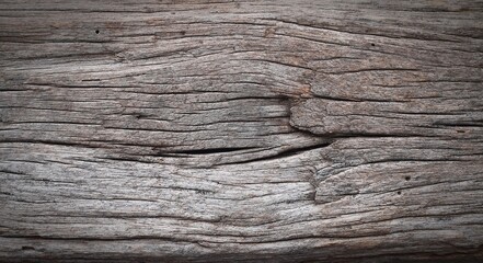 Naturally cracked texture of old wood for vintage decoration.