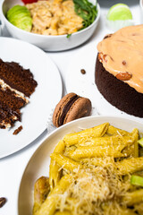 Set of festive meals of meat and vegetables and sweets on white background isolated. Menu set.