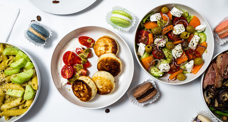 Set of festive meals of meat and vegetables and sweets on white background isolated. Menu set.