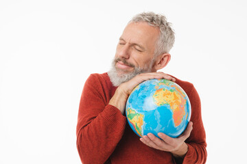 Cheerful caucasian mature middle-aged man holding embracing hugging globe Earth for environment nature protection isolated in white background