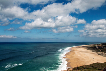 Fototapeta na wymiar View of the Atlantic coast in Portugal, beach in Nazaré