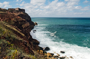 Fototapeta na wymiar View of the Atlantic coast in Portugal, beach in Nazaré