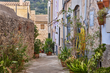 Fototapeta na wymiar Picturesque stone street in Mallorca island. Bunyola village. Spain