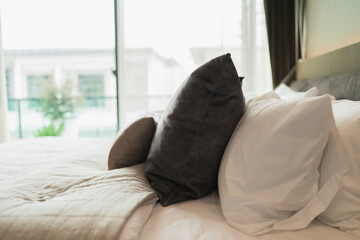 bedroom interior design close up,home interior concept soft pillow arrange on king size white...