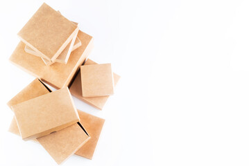 Cardboard boxes on a white background with space for writing text.