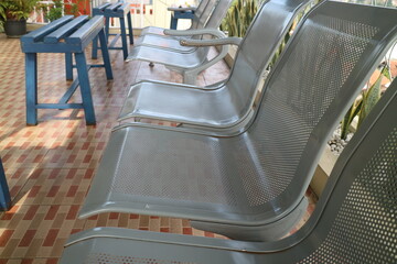 long iron seat on the floor