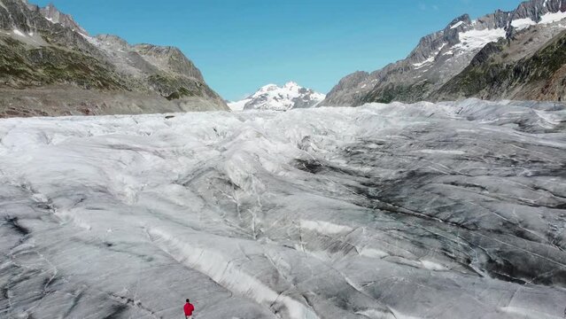 Aerial view of Great Aletsch Glacier, Alps, Switzerland. Drone footage 4K.