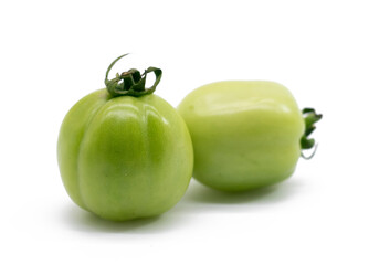 Fresh green tomatoes isolated on white background