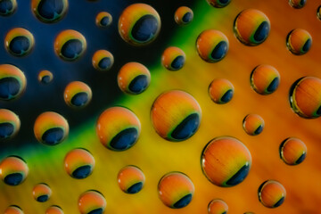 Water drop on glass with unique eye shaped images. Great for background use