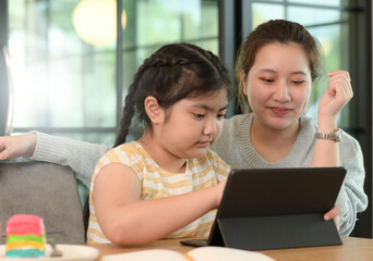 Asian girls study with a tutor, private lessons at home, sisters and sisters.