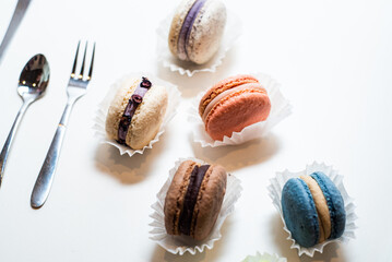 colorful macaroons isolated on white background closeup