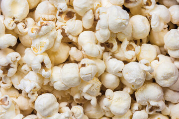 Macro close up of popped popcorn kernels with a shallow depth of field