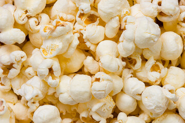 Macro close up of popped popcorn kernels with a shallow depth of field