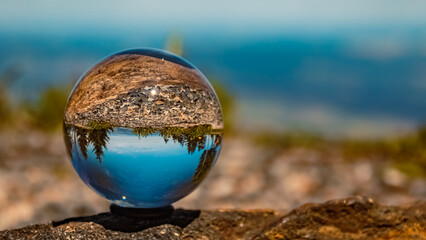 Crystal ball landscape shot at the famous Hohenbogen summit, Bavarian forest, Bavaria, Germany