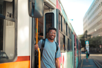 portrait of young man on a tram