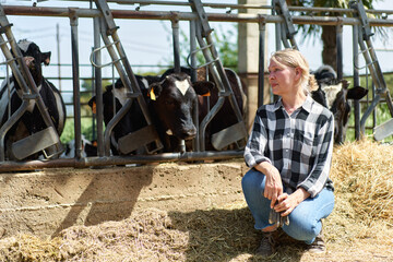 portrait of farmer woman at cow farm