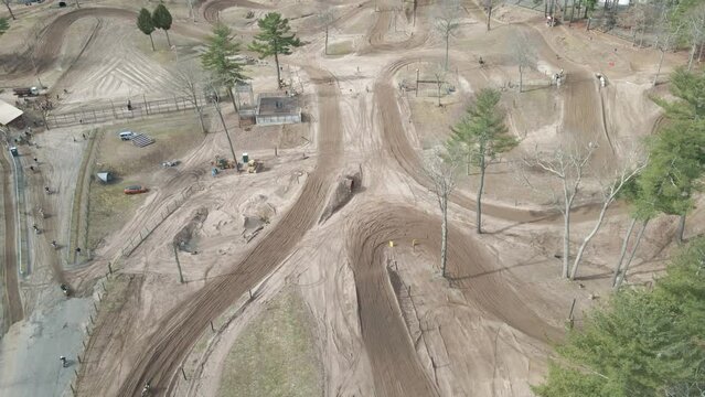 aerial drone shot of dirtbike track (flyover) shit in 4k 24p