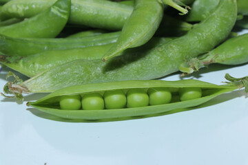 Pea pods isolated on a white background. Green peas. Healthy eating. Green plant