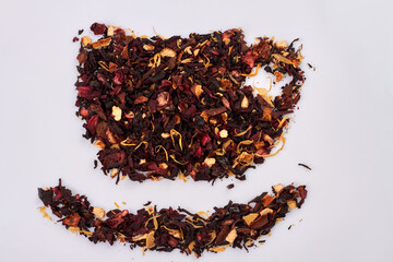 Many dry hibiscus petals in the shape of tea cup. Isolated on white background.