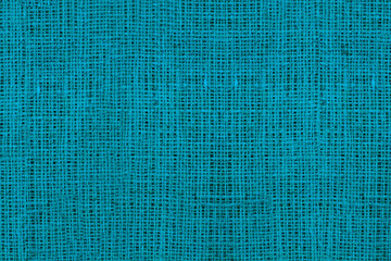 Blue burlap with beautiful canvas texture of blue fabric in retro style with beautiful blue fabric...