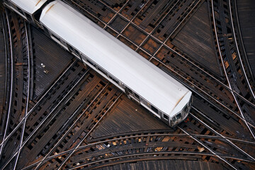 High angle view of passenger train on junction. Elevated railroad track in Chicago downtown. .