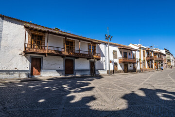 Fototapeta na wymiar Teror at Gran Canaria, Spain. A beautiful traditional town with colorful houses with wooden balconies