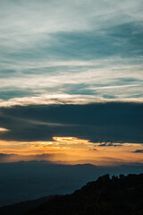 The view from the top of the mountain at sunset, taken from a bird's eye view