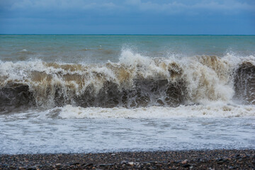 Stormy sea waves breaking near the coast