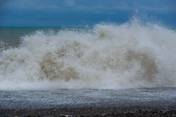 Stormy sea waves breaking near the coast