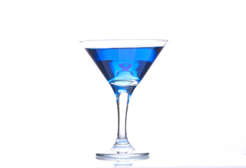 Blue lagoon cocktail in martini glass isolated on white background