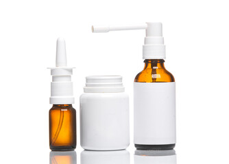 Bottles of medicines isolated on white background with reflection